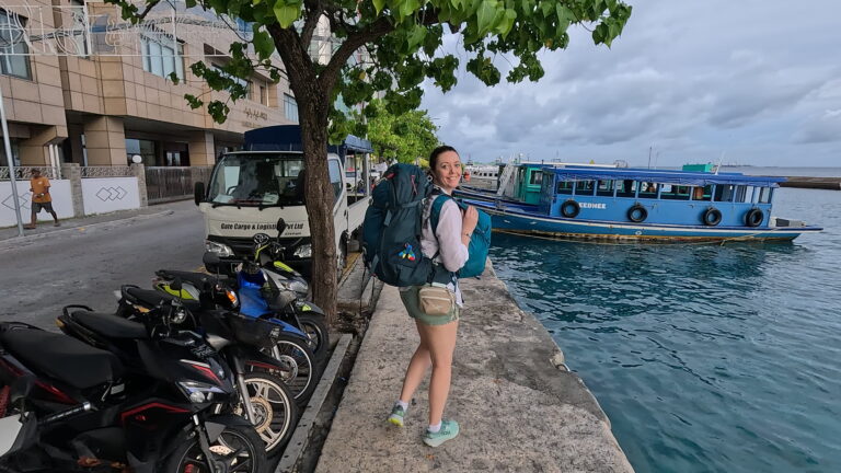 walking along the boardwalk in male, the maldives with my 2 backpacks really backpacking maldives