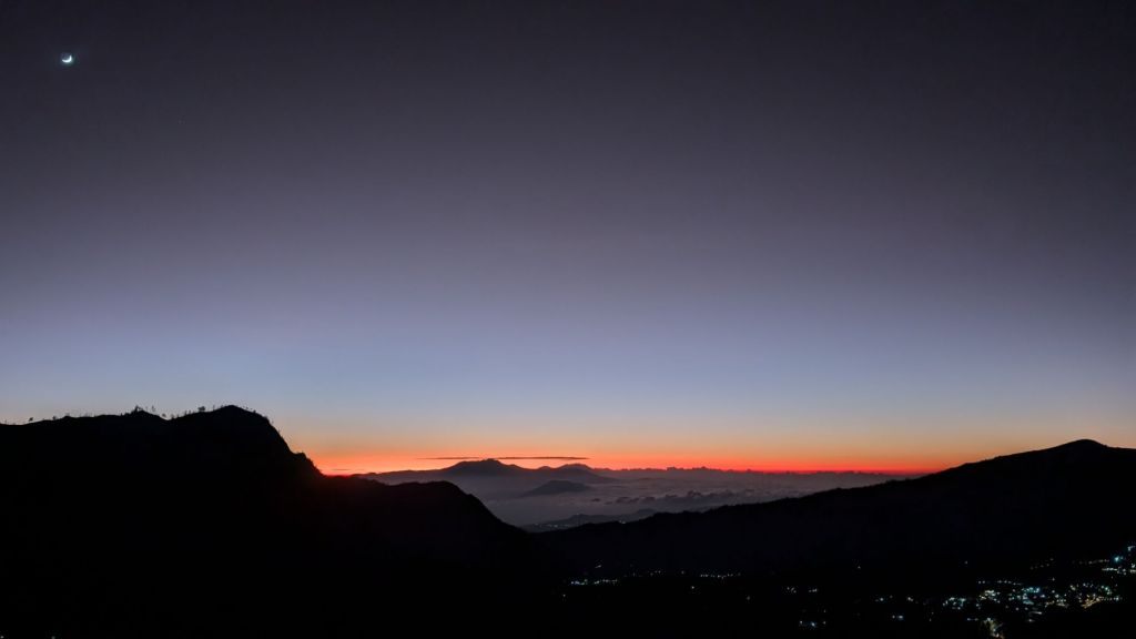 an orange glowing sunrise in East Java, Indonesia
