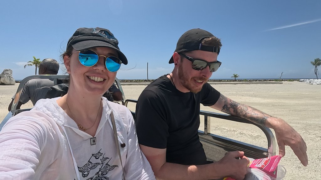 ride on the back of a mini pick-up truck to our guesthouse
