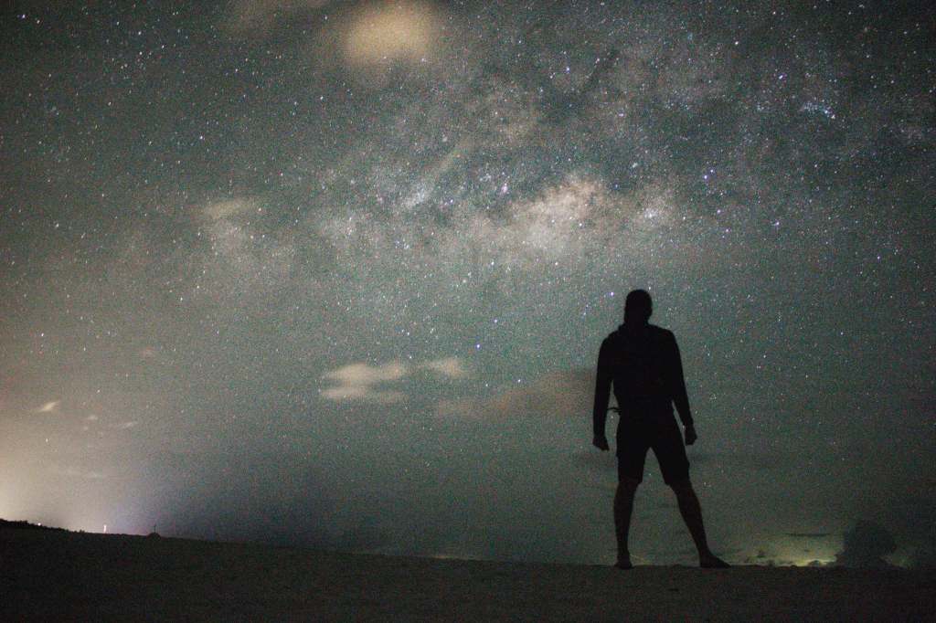 dave admires the night sky showing the entire milky way above fulhadhoo
